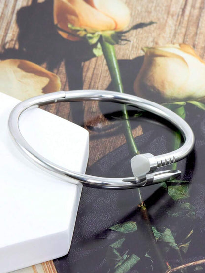 Gleaming Gold Tone Stainless Steel Four Leaf Clover Bangle