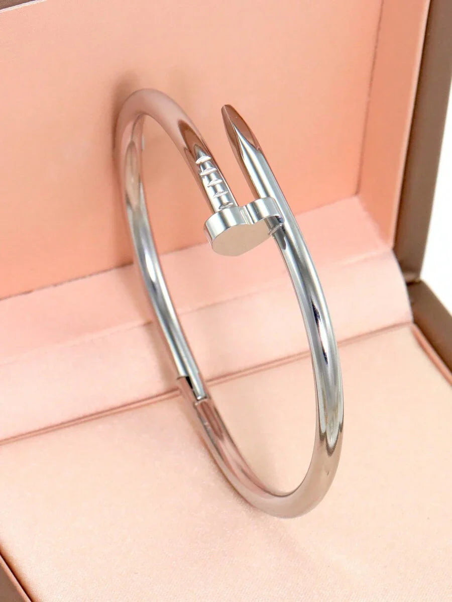 Gleaming Gold Tone Stainless Steel Four Leaf Clover Bangle