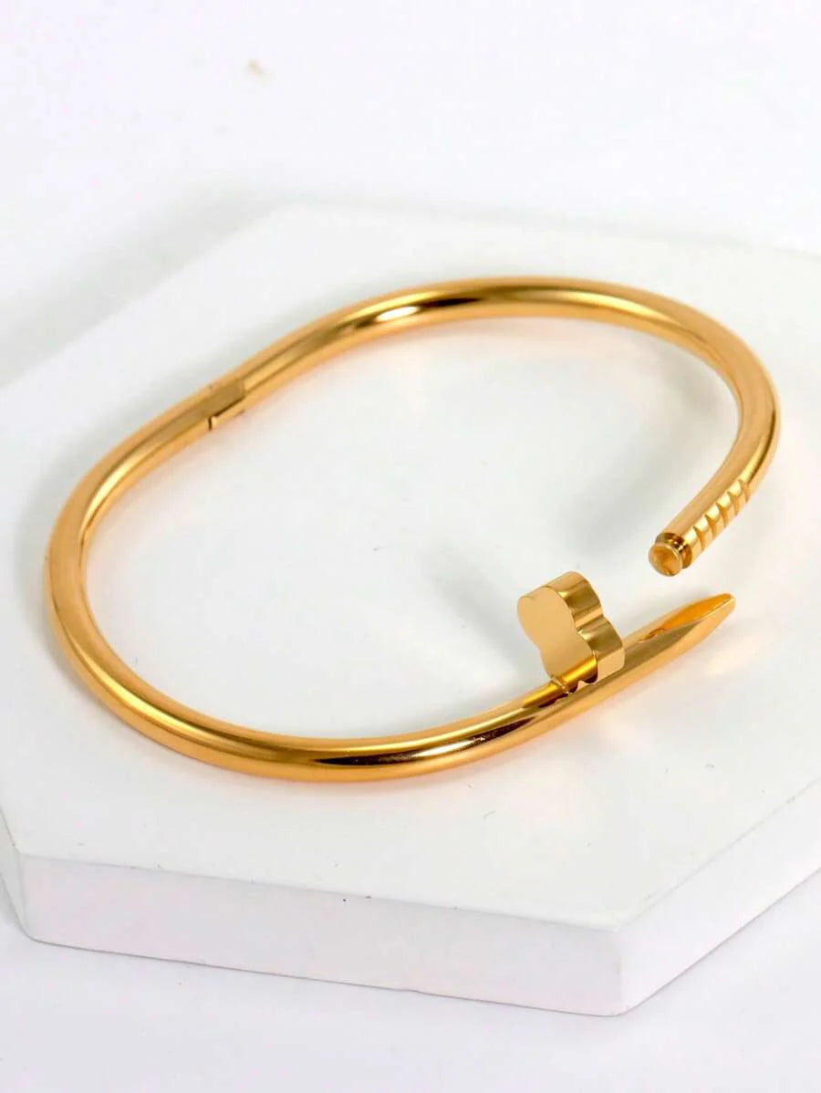 Gleaming Gold Tone Stainless Steel Four Leaf Clover Bangle
