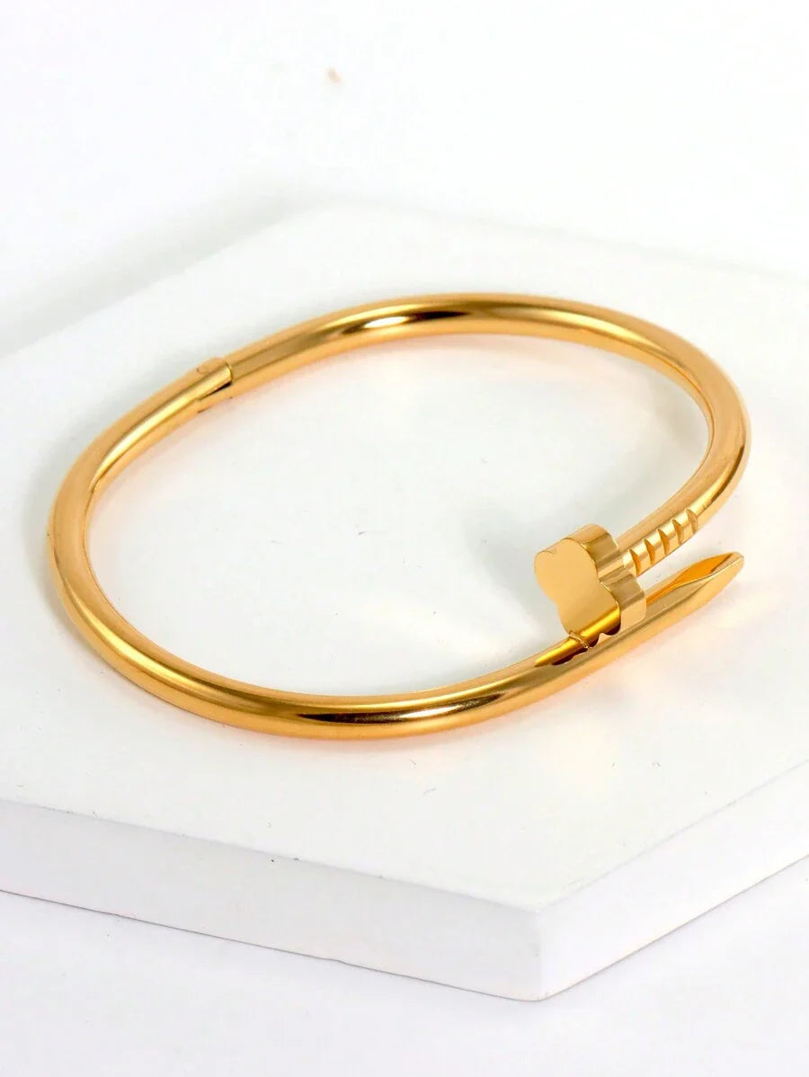 Gleaming Gold Tone Stainless Steel Four Leaf Clover Bangle