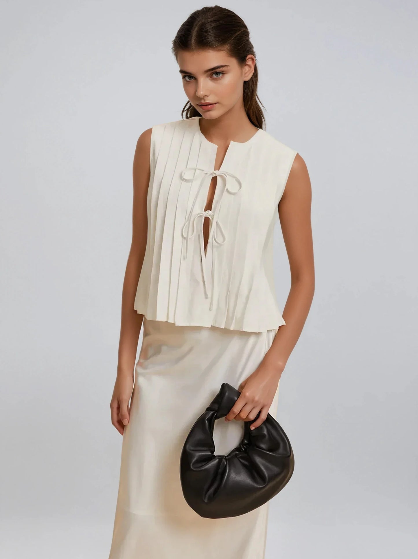 Pleated Knotted Sleeveless Blouse